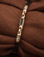 Браслет из золота c кожаным шнурком и ониксом