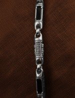 Гайтан из белого золота c кожаным шнурком и ониксом