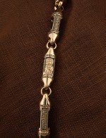 Гайтан из золота c кожаным шнурком и ониксом