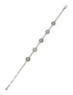 Браслет из белого золота c бриллиантами, ониксом и перламутром