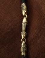 Гайтан из лимонного золота c кожаным шнурком и ониксом