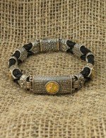 Браслет из серебра и золота c кожаным шнурком