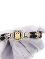 Браслет из серебра и золота c кожаным шнурком и ониксом