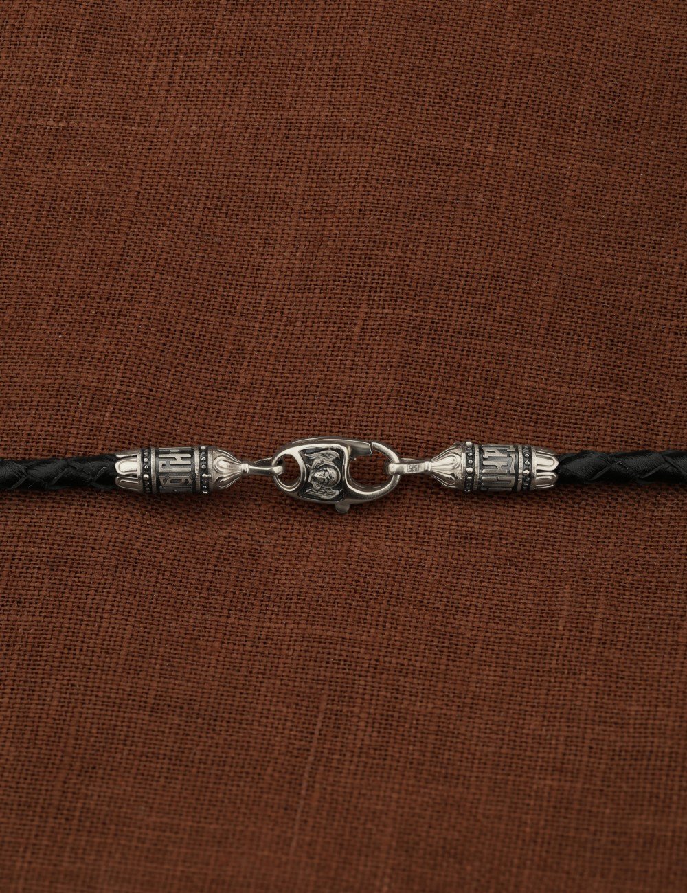 Гайтан из белого золота c кожаным шнурком