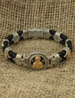 Браслет из серебра и золота c кожаным шнурком и ониксом