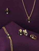 Серьги из лимонного золота c бриллиантами и ониксом