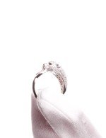 Кольцо из белого золота c бриллиантами и изумрудом