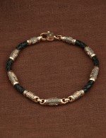 Браслет из золота c кожаным шнурком