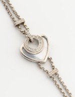 Браслет из белого золота c бриллиантами, ониксом и перламутром