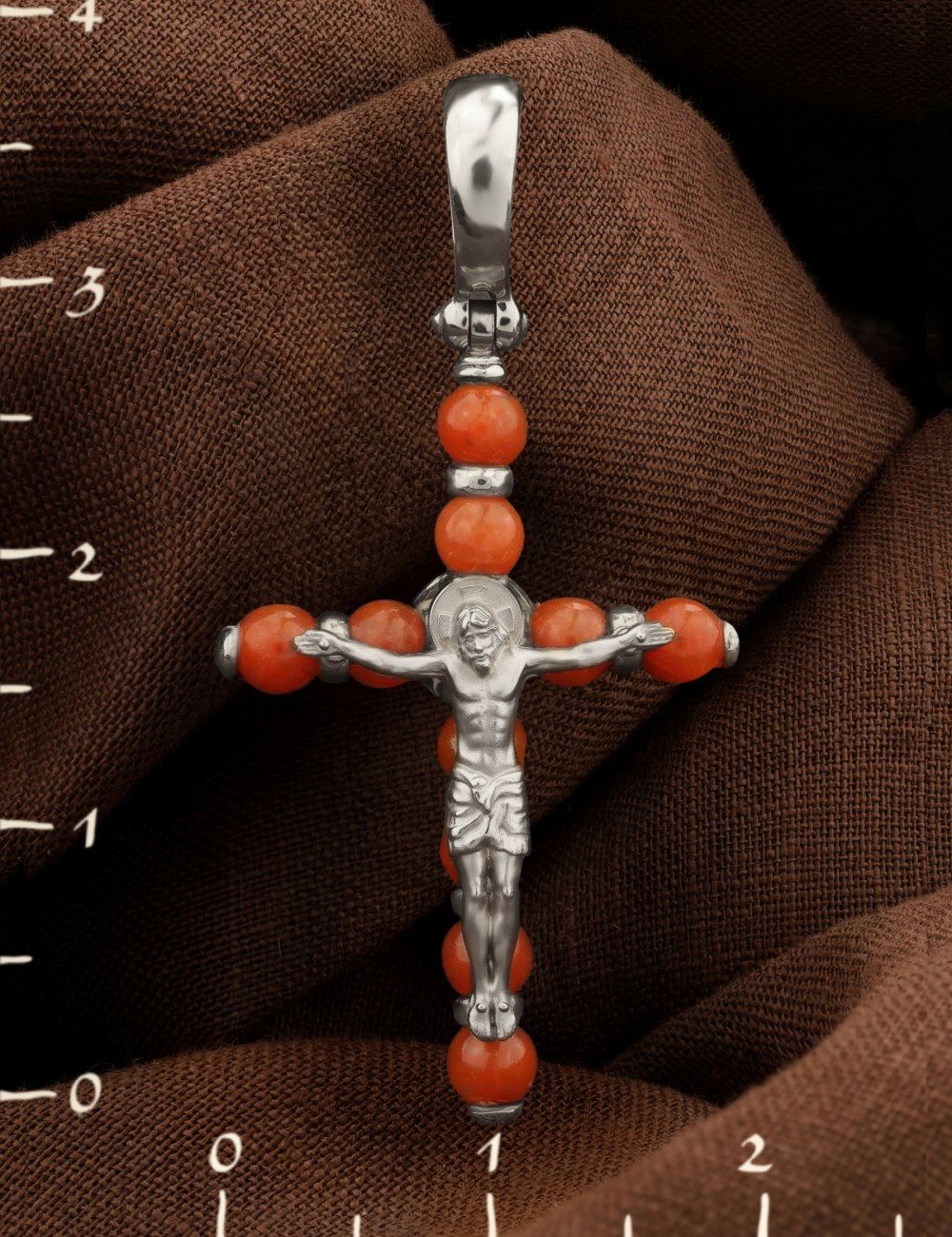 Крест из белого золота c кораллом