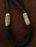 Гайтан из лимонного золота c кожаным шнурком и ониксом