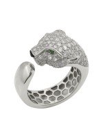 Кольцо из белого золота c бриллиантами, изумрудом и ониксом