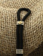 Браслет из серебра и золота c ониксом и шёлковым шнурком