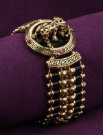 Браслет из лимонного золота c эмалью, ониксом и рубином