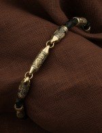 Браслет из лимонного золота c кожаным шнурком