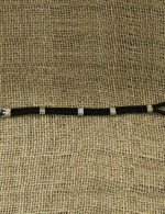 Браслет из серебра и золота c ониксом и шёлковым шнурком