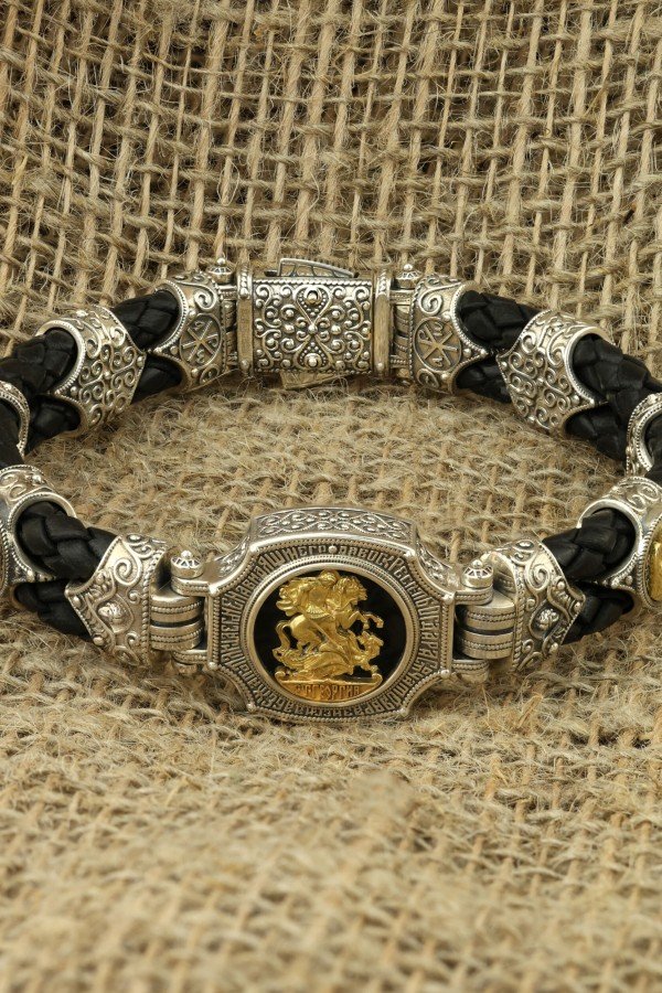 Браслет из серебра и золота c кожаным шнурком и ониксом