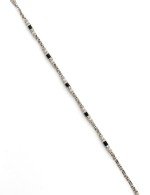 Браслет из белого золота c жемчугом и ониксом