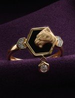 Кольцо из золота c бриллиантами и ониксом