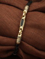 Браслет из лимонного золота c кожаным шнурком и ониксом