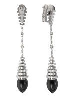 Серьги из белого золота c бриллиантами и ониксом