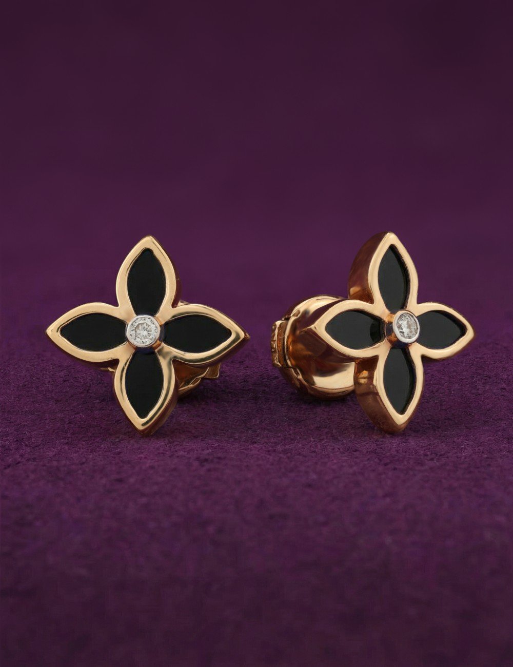 Серьги из золота c бриллиантами и ониксом