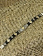 Браслет из серебра и золота c кожаным шнурком