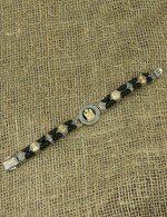 Браслет из серебра и золота c кожаным шнурком и ониксом