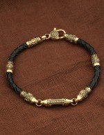 Браслет из лимонного золота c кожаным шнурком и ониксом