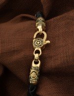 Браслет из лимонного золота c кожаным шнурком и ониксом