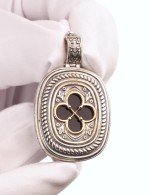 Подвеска из серебра и золота c ониксом и рубином