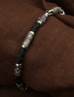 Браслет из белого золота c кожаным шнурком