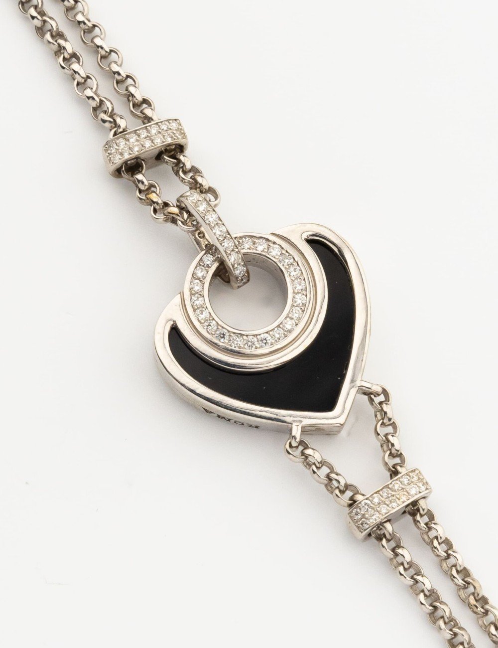 Браслет из белого золота c бриллиантами, ониксом и перламутром