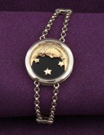 Браслет из белого золота c ониксом и перламутром