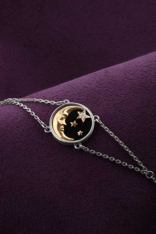 Браслет из белого золота c бриллиантами и ониксом