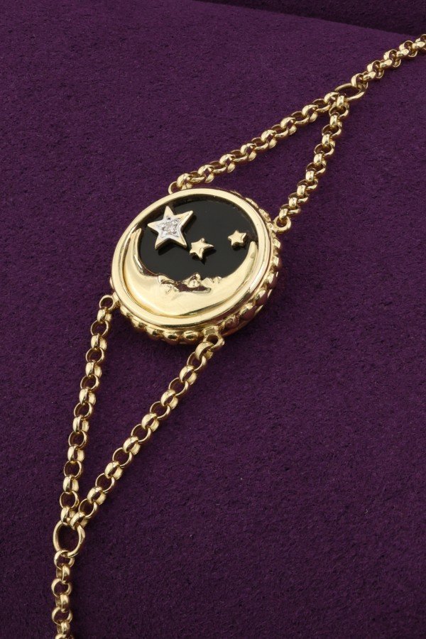 Браслет из лимонного золота c бриллиантами, ониксом и перламутром