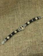 Браслет из серебра и золота c кожаным шнурком и ониксом