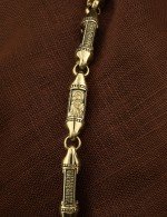 Гайтан из лимонного золота c кожаным шнурком и ониксом