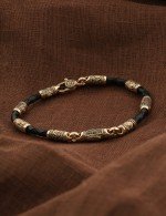 Браслет из золота c кожаным шнурком