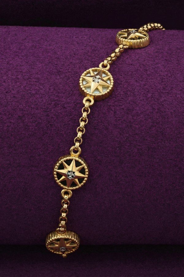 Браслет из лимонного золота c бриллиантами, ониксом и перламутром