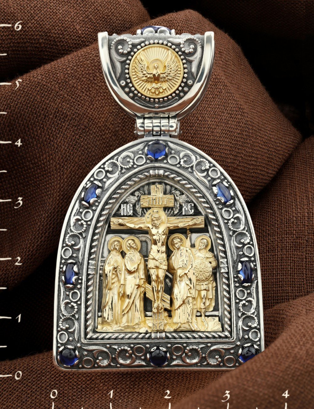 Образок из серебра 925 пробы и золота 585 пробы c сапфиром