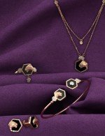 Серьги из золота c бриллиантами и ониксом