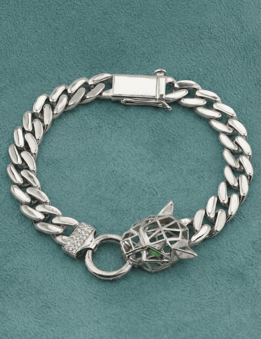 Браслет из белого золота c бриллиантами и изумрудом