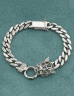 Браслет из белого золота c бриллиантами и изумрудом