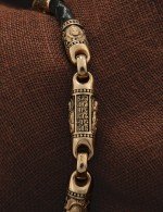 Браслет из золота c кожаным шнурком