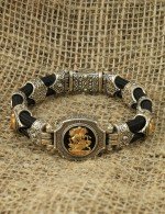 Браслет из серебра и золота c ониксом и шёлковым шнурком